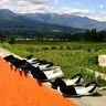Traditional shoes drying on the roof, with Cotacachi in the background